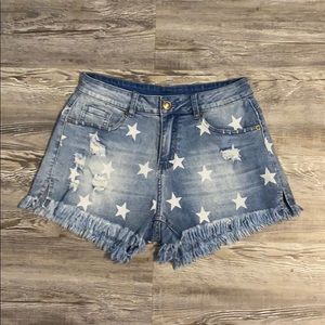 Star printed jean shorts